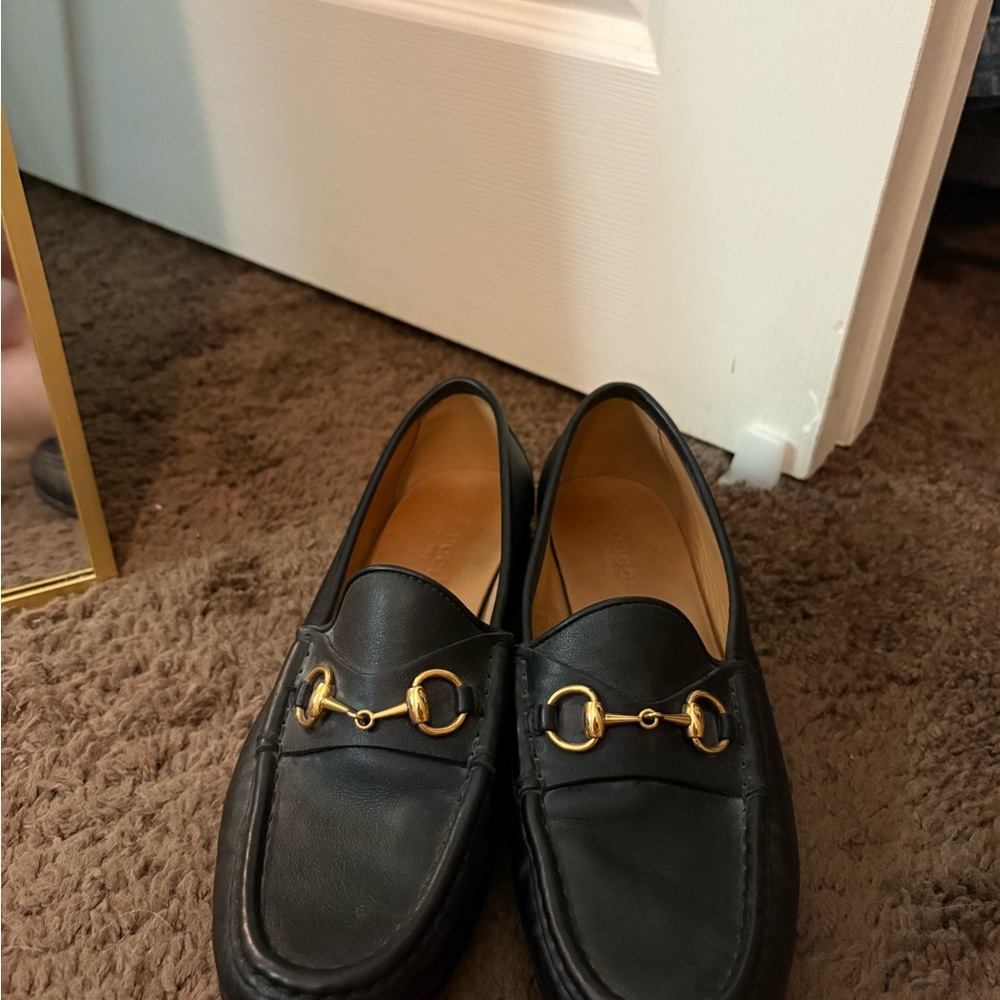 AUTHENTIC Gucci Black Leather Loafers with Gold Detailing